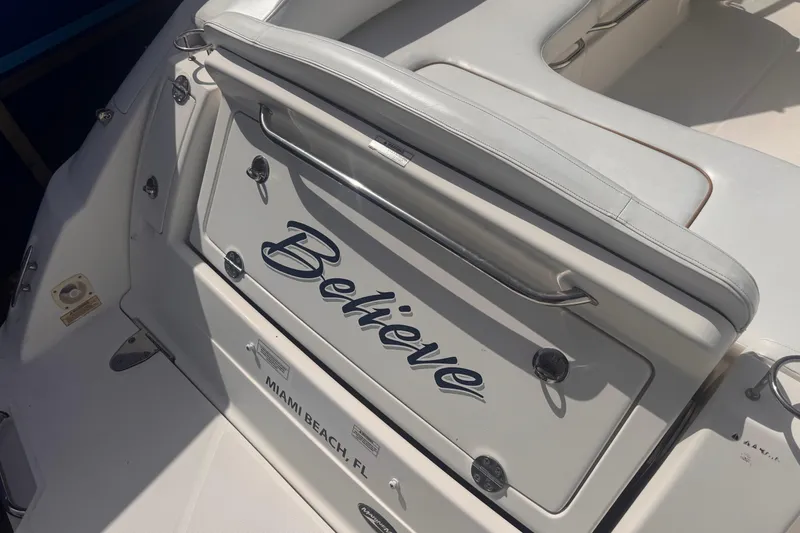 Slide: The Image of 2009 Sea Ray 270 Sundancer boat with "Believe" name, docked in Miami Beach, FL. - 11