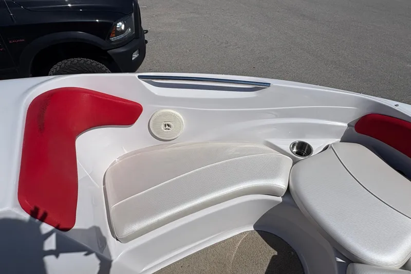 Slide: The Image of Interior seating of 2011 Four Winns H190SS boat with red and white upholstery. - 13