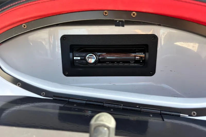 Slide: The Image of Sony stereo system installed in a 2011 Four Winns H190SS boat dashboard. - 6