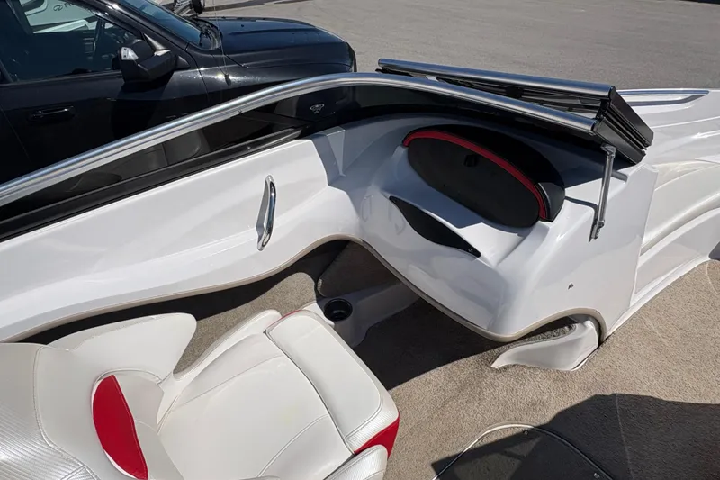 Slide: The Image of Interior of 2011 Four Winns H190SS boat with white and red seating. - 9