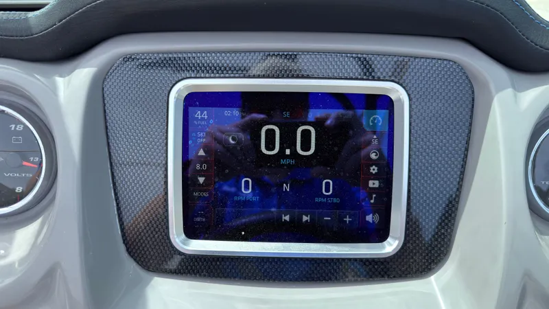Slide: The Image of The image shows the dashboard of a 2017 Chaparral Vortex 223 VRX with a digital display. - 22