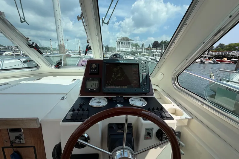 Slide: The Image of Interior view of 2006 Back Cove 29 boat cockpit with navigation equipment. - 17