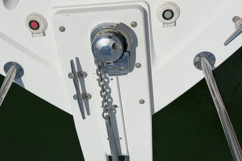 Slide: The Image of Anchor windlass on 2006 Back Cove 29 boat deck, featuring stainless steel fittings. - 35