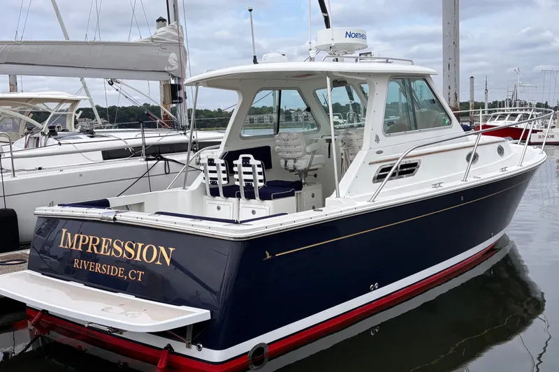 Slide: The Image of 2006 Back Cove 29 boat named "Impression" docked in Riverside, CT marina. - 51