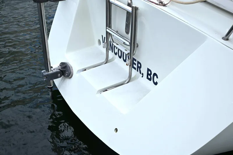 Slide: The Image of 1994 J Boats J/130 sailboat stern with ladder, docked in Vancouver, BC. - 23