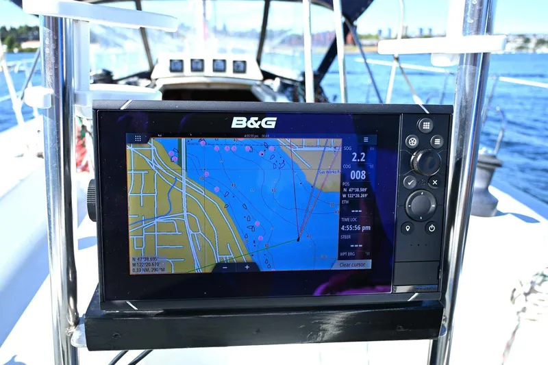 Slide: The Image of Navigation system on a 1994 J Boats J/130 sailboat, displaying nautical charts. - 15