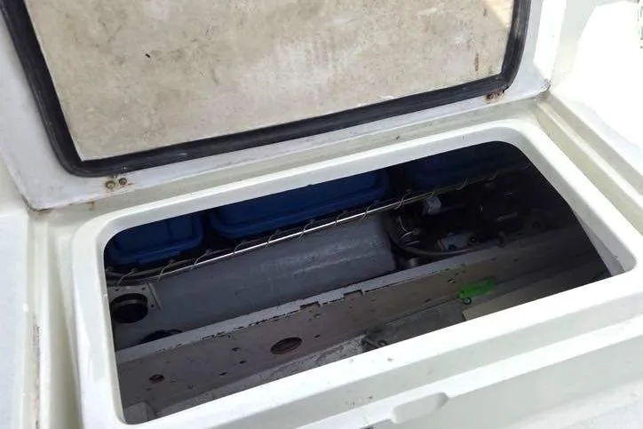Slide: The Image of Open storage compartment on a 1994 J Boats J/130 sailboat. - 35