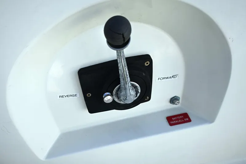 Slide: The Image of Throttle control lever on a 1994 J Boats J/130 sailboat, showing forward and reverse settings. - 18