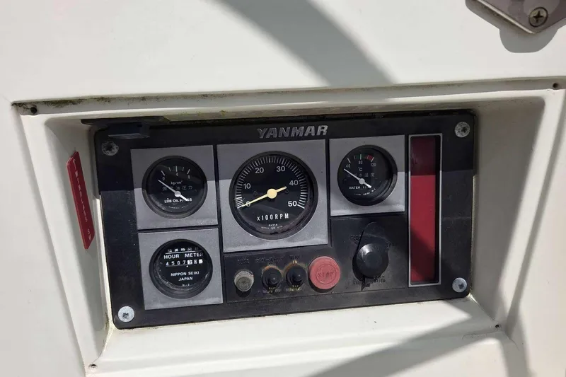 Slide: The Image of Control panel of a 1994 J Boats J/130 sailboat with Yanmar engine gauges. - 20