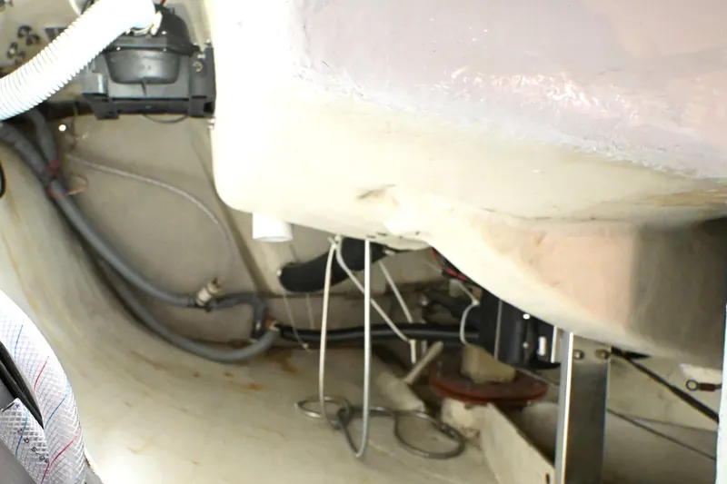 Slide: The Image of Interior view of 1994 J Boats J/130 sailboat, showcasing wiring and structural components. - 53