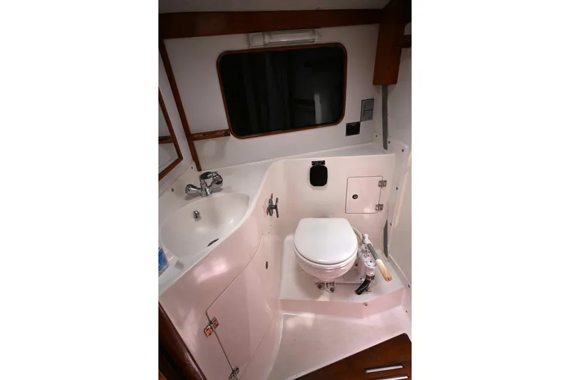 Slide: The Image of Interior view of 1994 J Boats J/130 yacht bathroom with sink and toilet. - 37