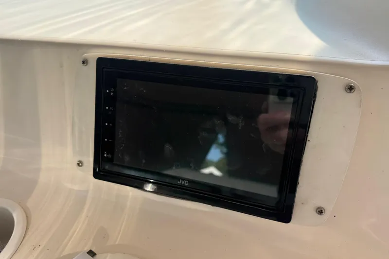 Slide: The Image of JVC display on 1996 Sea Ray 450 Sundancer boat dashboard. - 13