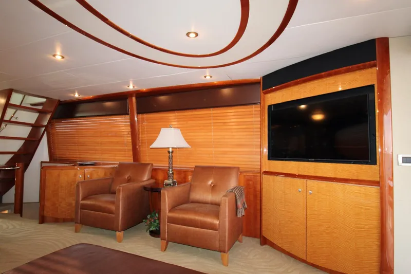 Slide: The Image of Luxurious interior of 2007 Lazzara 74 Motoryacht with leather chairs and flat-screen TV. - 13