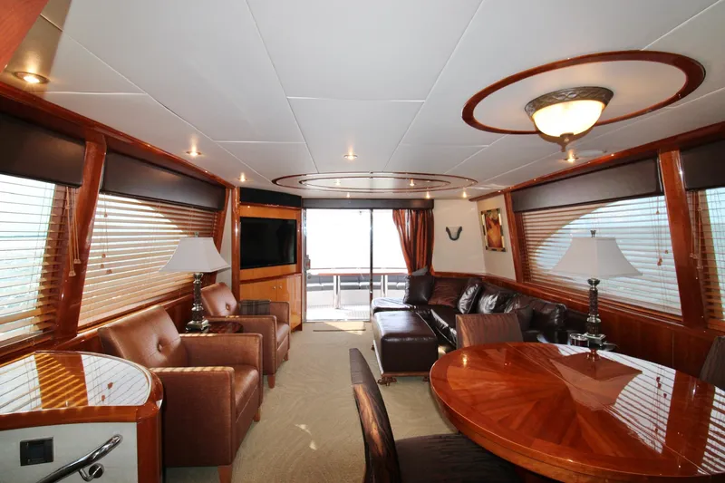 Slide: The Image of Luxurious interior of 2007 Lazzara 74 Motoryacht with elegant wood finishes and plush seating. - 10