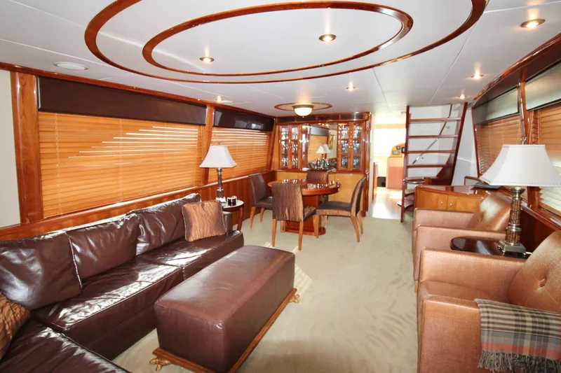 Slide: The Image of Luxurious interior of 2007 Lazzara 74 Motoryacht with leather seating and elegant wood finishes. - 11
