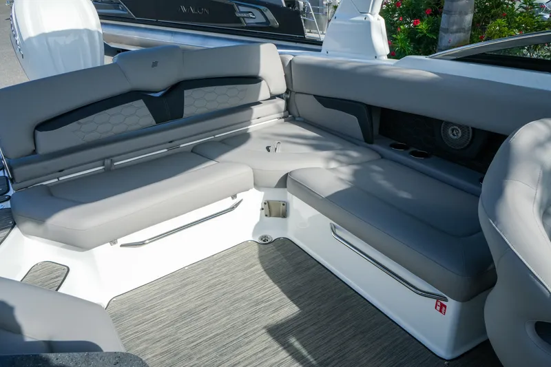 Slide: The Image of 2027 Four Winns HD8 OB boat interior with gray seating and modern design. - 31