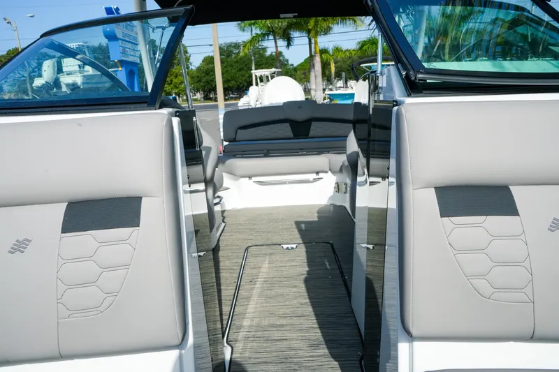 Slide: The Image of 2027 Four Winns HD8 OB boat interior with modern seating and sleek design. - 28