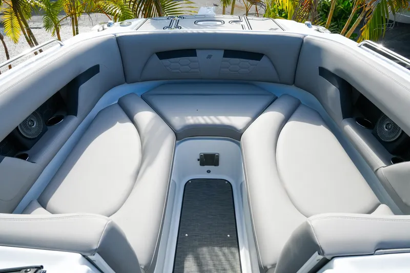 Slide: The Image of 2027 Four Winns HD8 OB boat interior with luxurious seating and modern design. - 23