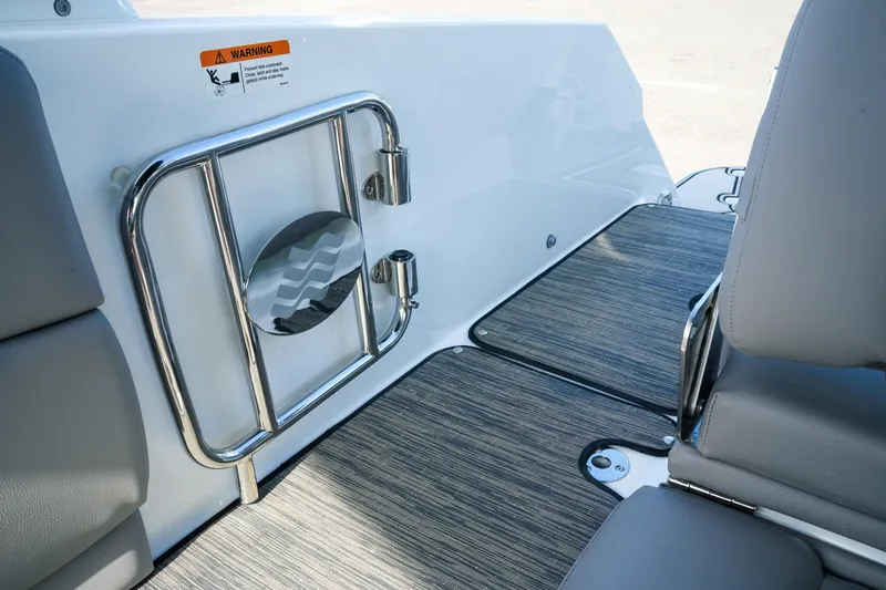 Slide: The Image of 2027 Four Winns HD8 OB boat interior with sleek seating and modern flooring design. - 36