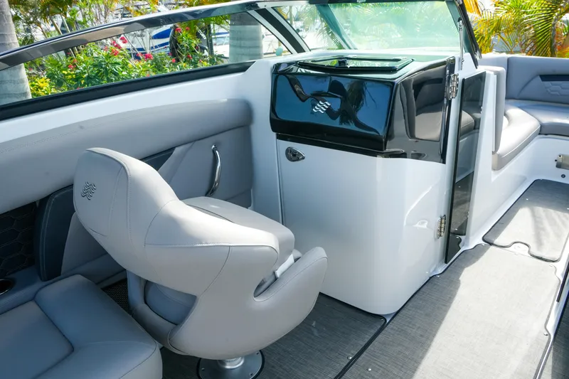 Slide: The Image of 2027 Four Winns HD8 OB boat interior with sleek seating and modern design. - 18