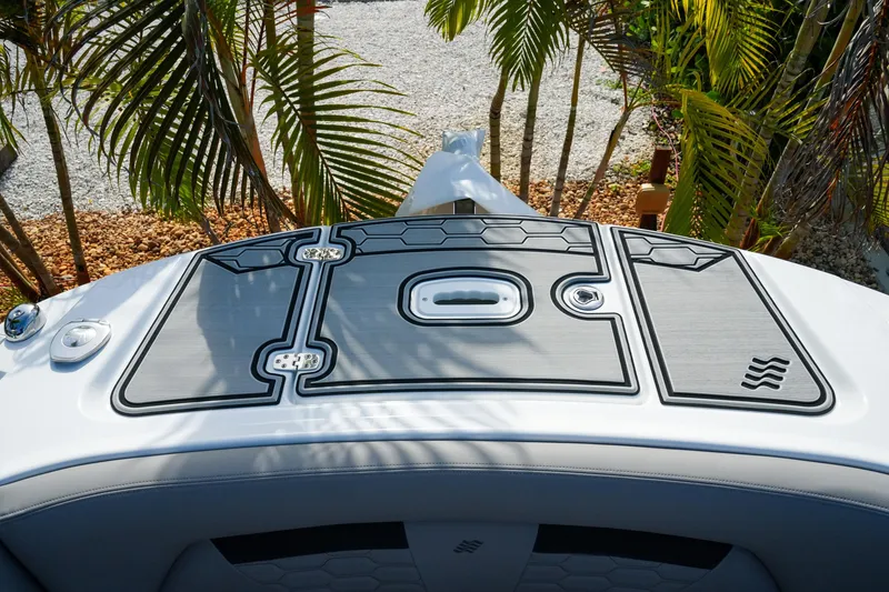 Slide: The Image of 2027 Four Winns HD8 OB boat deck with sleek design and modern features. - 24
