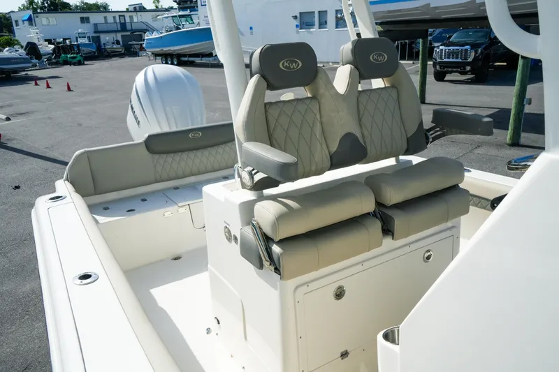 Slide: The Image of 2027 Key West 249 FS boat interior with dual cushioned seats and modern design. - 41