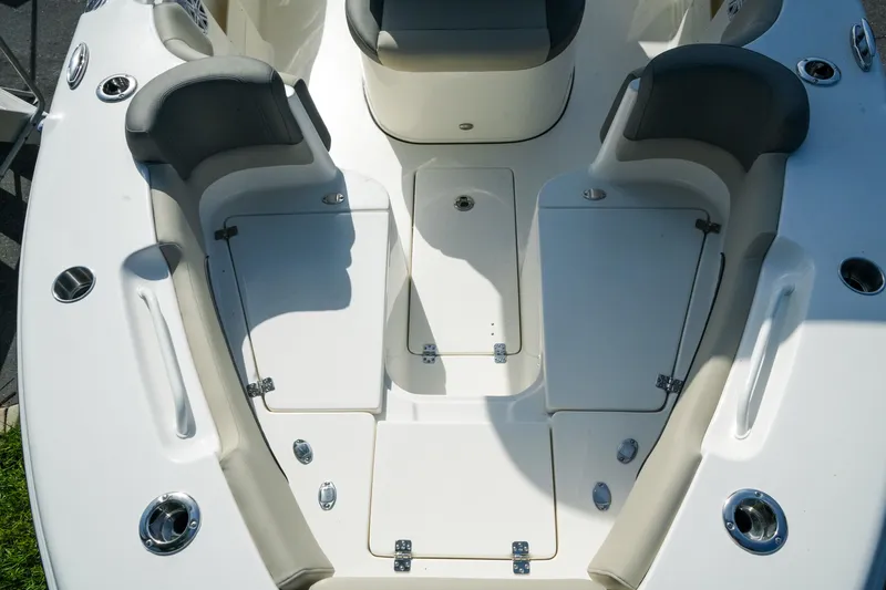 Slide: The Image of Interior view of 2027 Key West 249 FS boat, featuring seating and storage compartments. - 34
