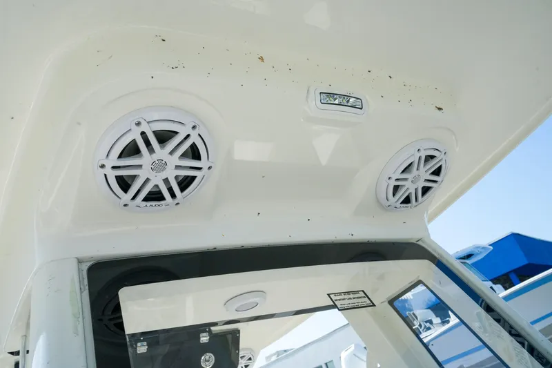 Slide: The Image of 2027 Key West 249 FS boat speakers and light on the interior ceiling. - 39