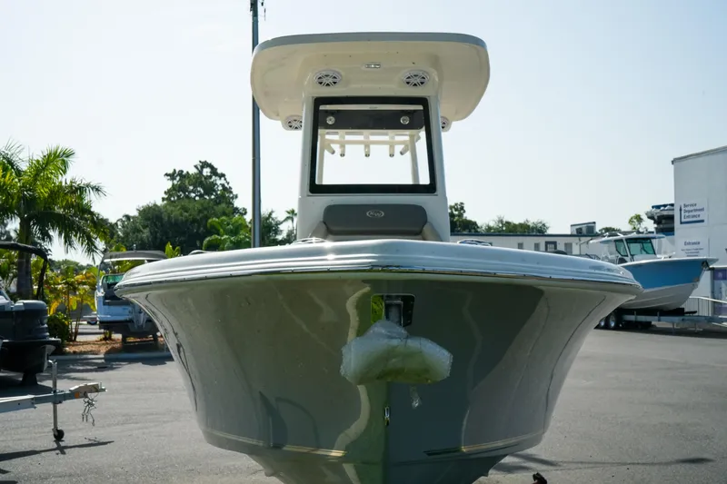 Slide: The Image of Front view of a 2027 Key West 249 FS boat in a sunny outdoor setting. - 4