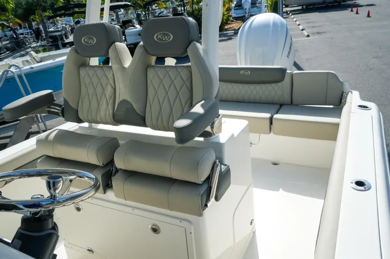 Slide: The Image of 2027 Key West 249 FS boat interior with luxurious seating and modern design. - 45