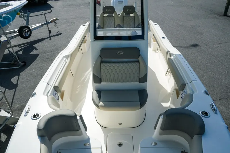Slide: The Image of 2027 Key West 249 FS boat interior with cushioned seating and modern design. - 36