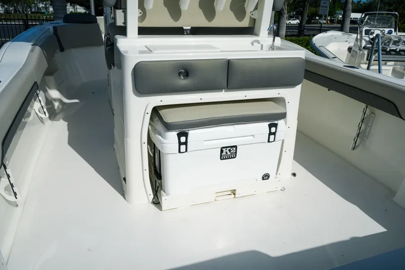 Slide: The Image of 2027 Key West 249 FS boat interior with seating and K2 cooler. - 16