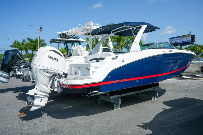 The Image of 2026 Four Winns HD8 OB boat with Yamaha outboard engine, displayed outdoors. - 1