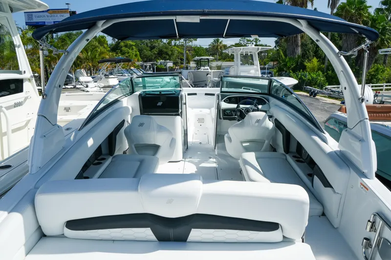 Slide: The Image of 2026 Four Winns HD8 OB boat interior with luxurious seating and modern design. - 9