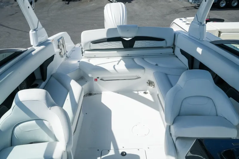 Slide: The Image of 2026 Four Winns HD8 OB boat interior with white seating and modern design. - 23