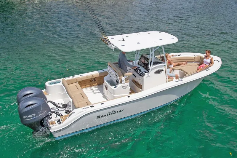 Slide: The Image of Manufacturer Provided Image: 2020 NauticStar 2602 Legacy boat on clear water with passengers. - 21