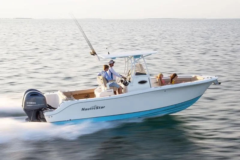 Slide: The Image of Manufacturer Provided Image: 2020 NauticStar 2602 Legacy boat cruising on open water. - 17