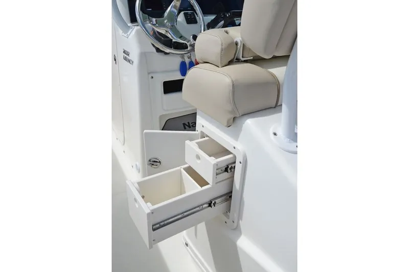 Slide: The Image of Manufacturer Provided Image: 2020 NauticStar 2602 Legacy boat with open storage drawers. - 27