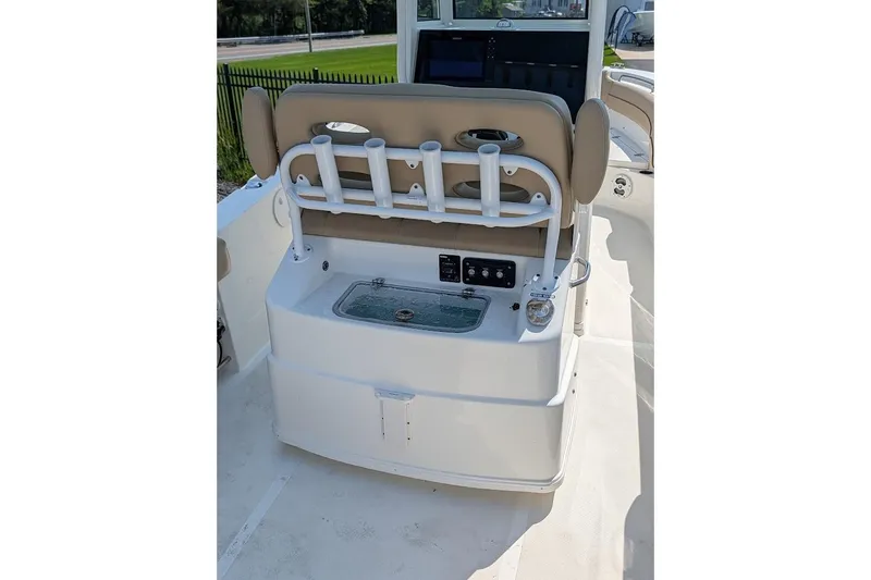 Slide: The Image of 2020 NauticStar 2602 Legacy boat interior with seating and control panel. - 4