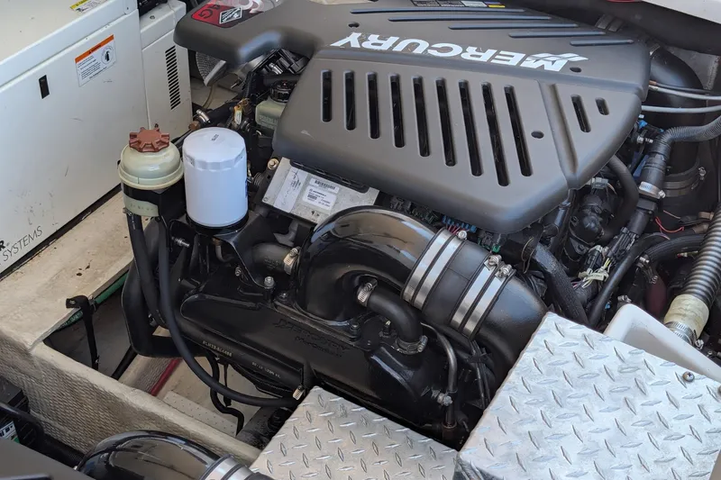 Slide: The Image of Engine compartment of a 2005 Regal Commodore 3560 IO with a Mercury engine. - 30