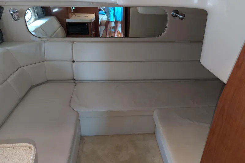 Slide: The Image of Interior of 2005 Regal Commodore 3560 IO yacht with beige seating and modern design. - 4