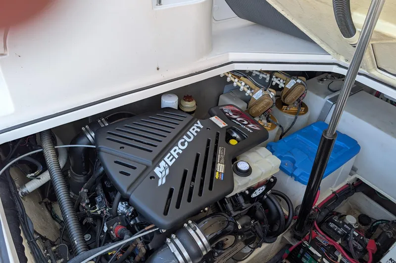 Slide: The Image of Engine compartment of a 2005 Regal Commodore 3560 IO with Mercury engine components. - 29