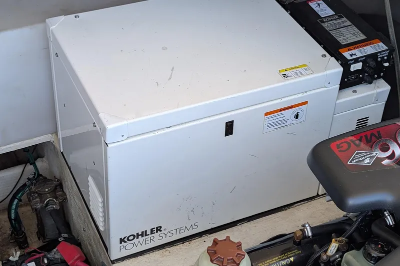 Slide: The Image of Kohler power system in 2005 Regal Commodore 3560 IO boat engine compartment. - 25