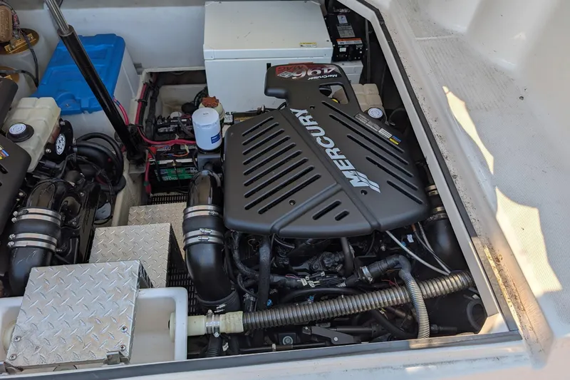 Slide: The Image of Engine compartment of a 2005 Regal Commodore 3560 IO with Mercury components. - 27