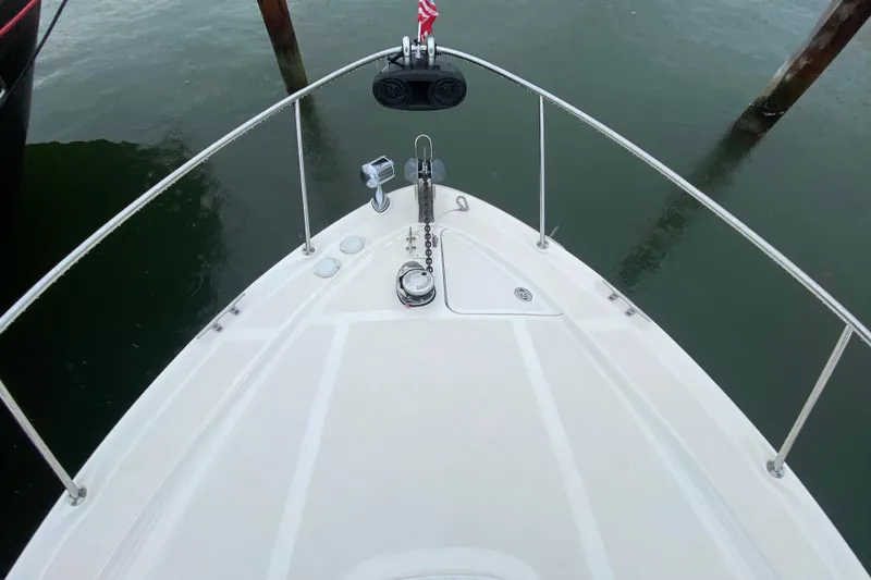 Slide: The Image of Top view of 2004 Sea Ray 340 Sundancer boat bow with anchor and railing. - 11