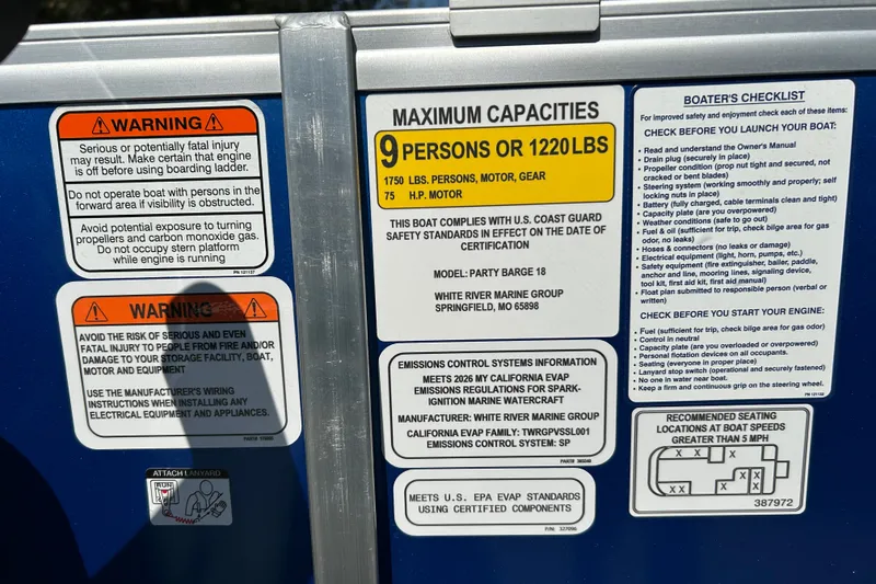 Slide: The Image of 2026 Sun Tracker Party Barge 18 DLX safety and capacity warnings, including maximum load and boater's checklist. - 22