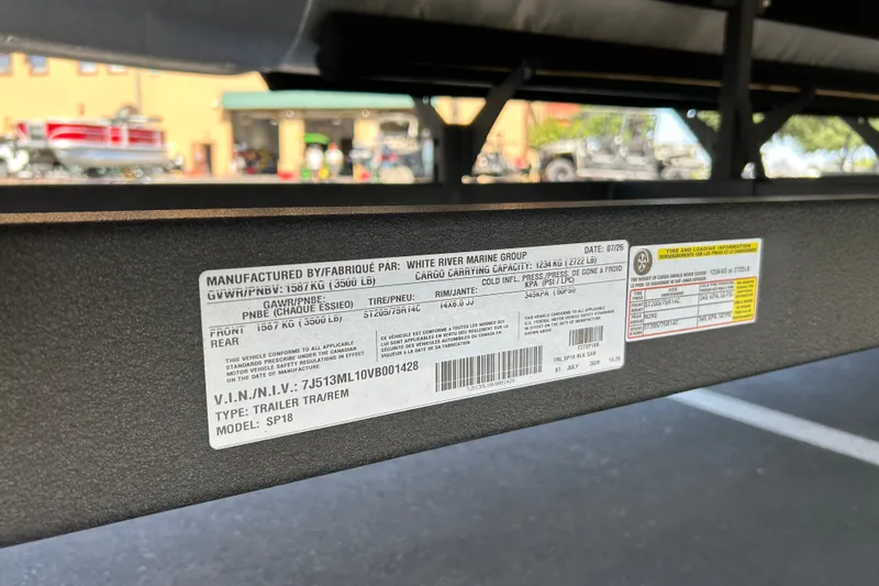 Slide: The Image of Label on Sun Tracker Party Barge 18 DLX trailer, manufactured by White River Marine Group. - 96