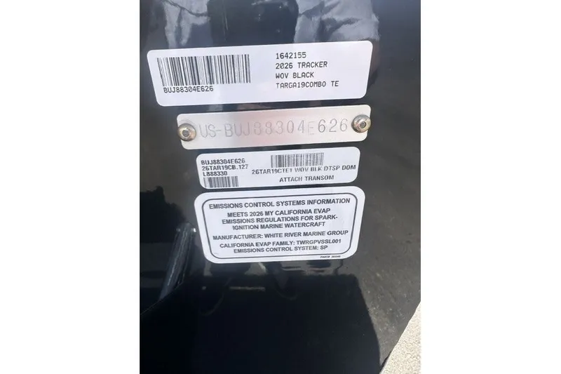 Slide: The Image of 2026 Tracker Targa V-19 Combo boat identification and emissions labels. - 21