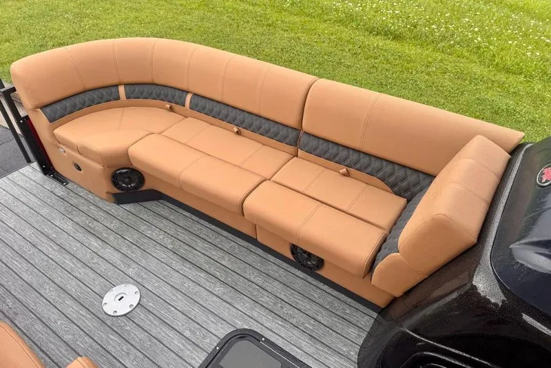 Slide: The Image of Luxurious seating on 2026 Ranger 223FC boat, featuring tan upholstery and modern design. - 15