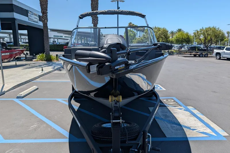 Slide: The Image of 2026 Tracker Pro Guide V-175 Combo boat parked in a dealership lot. - 4